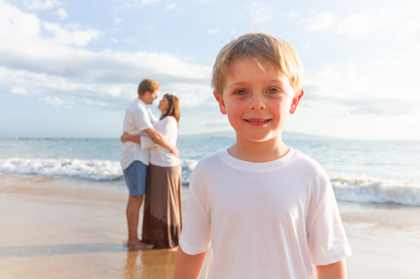 A child during a warm sunset mini session in Maui